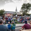 A crowd of people watch a concert at the Brewery Arts Center in Carson City.