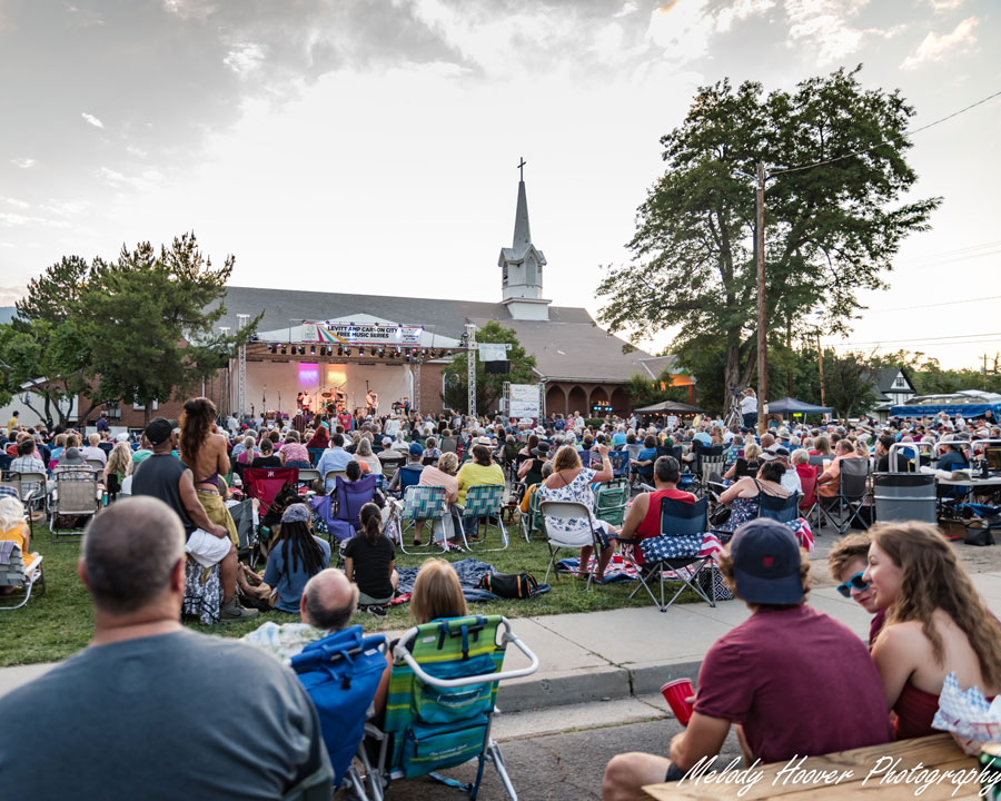A crowd of people watch a concert at the Brewery Arts Center in Carson City.